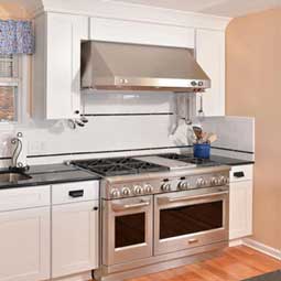 Kitchen Remodel with stove and hood.
